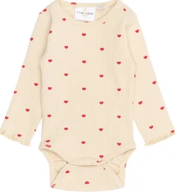 The New Siblings Body l/æ - TnsbRhea - Rib - Gardenia AOP