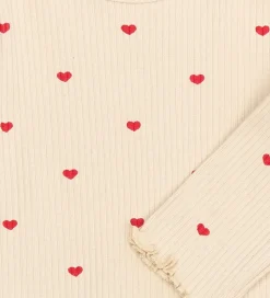 The New Siblings Body l/æ - TnsbRhea - Rib - Gardenia AOP